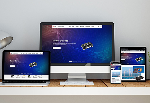 a responsive website displayed across a smartphone, tablet, laptop and desktop computer